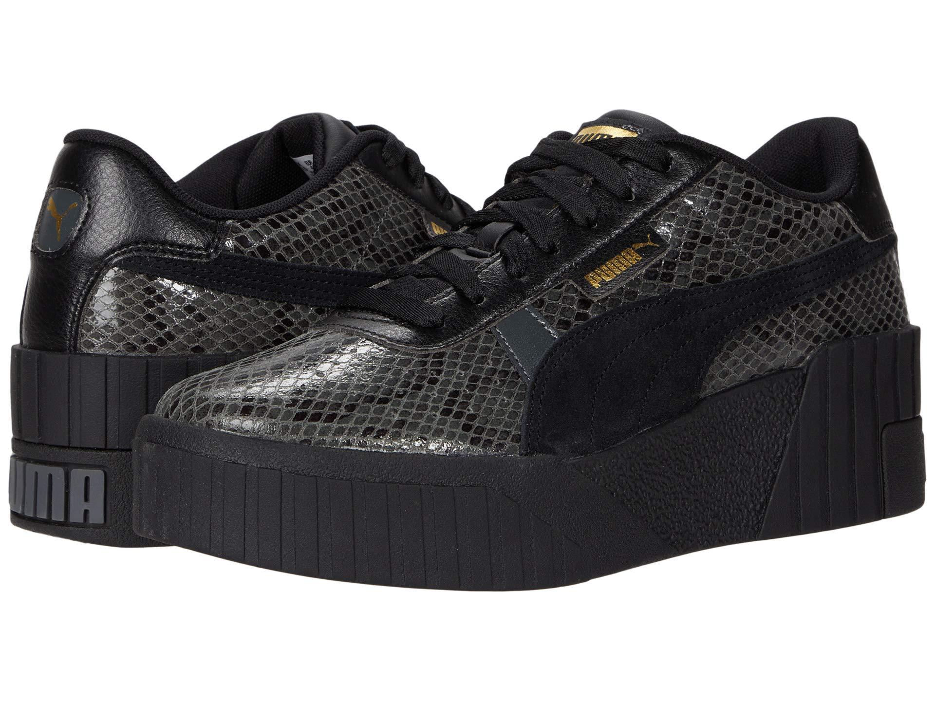 PUMA Cali Wedge Snake in Black | Lyst