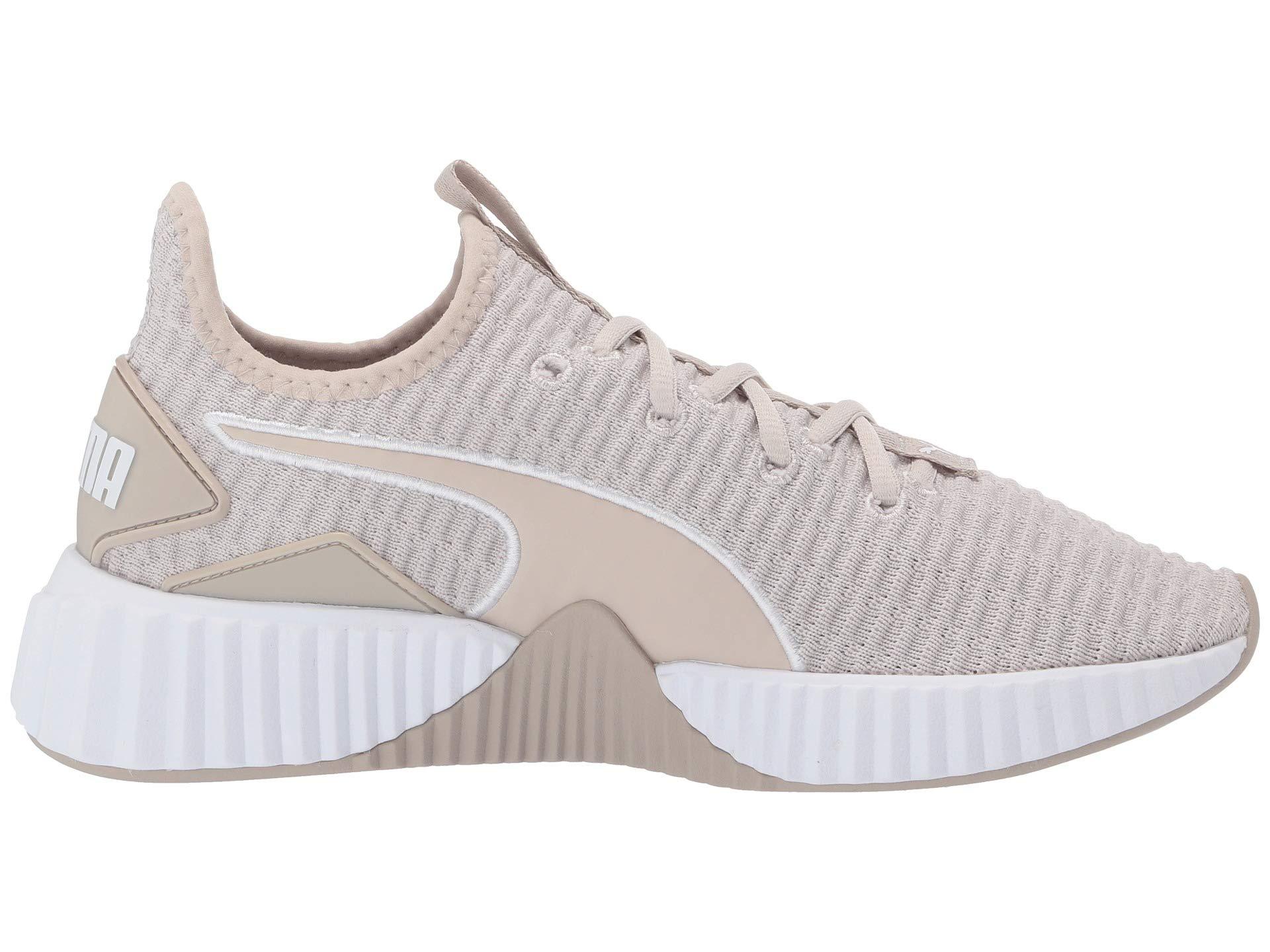 puma defy white pale pink